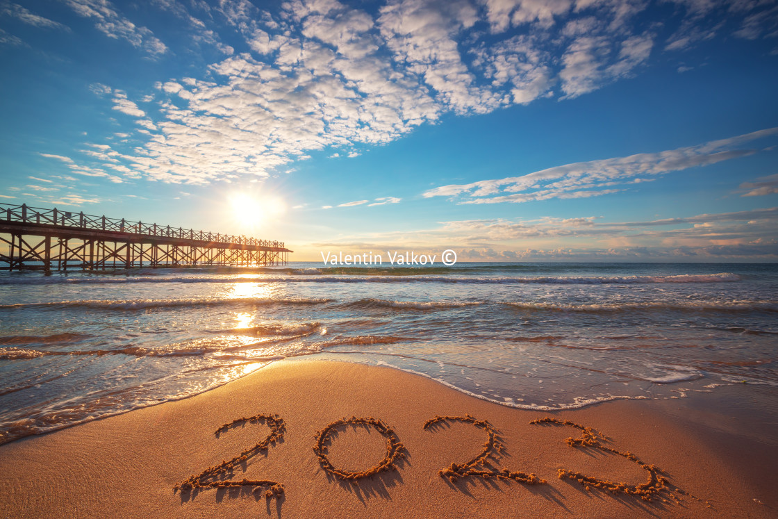 "Happy New Year 2023 concept, lettering on the beach. Written tex" by Valentin Valkov - $24.48 "Happy New Year 2023 concept, lettering on the beach. Written tex" stock image