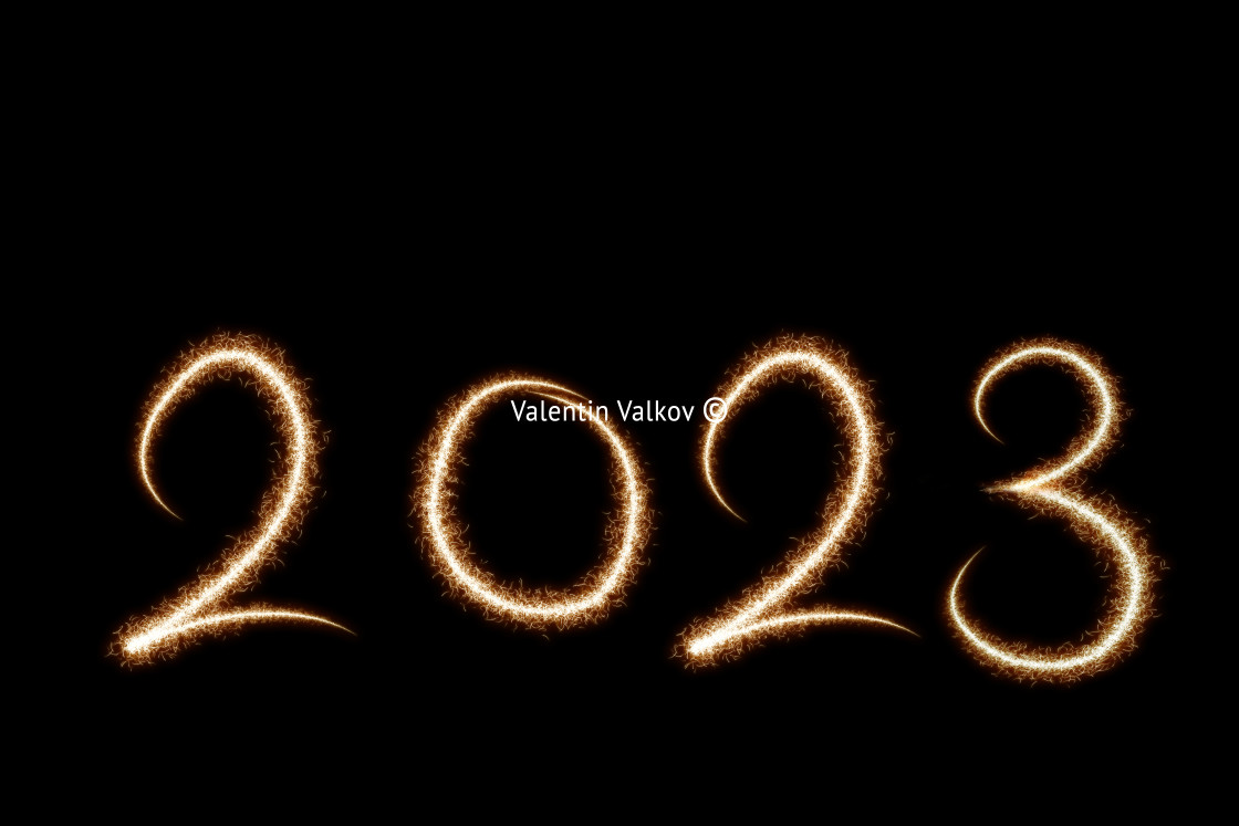 "2023 written with Sparkle firework on black background, happy ne" stock image