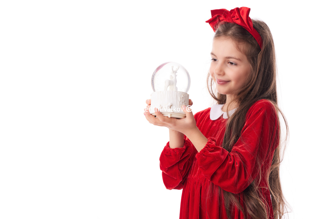 "Smiling woman with Christmas tree shining balls, girl posing in" stock image