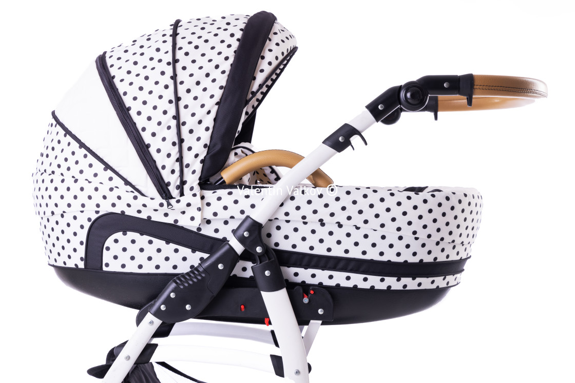 "Modern baby stroller with bassinet and car seat isolated on a wh" stock image