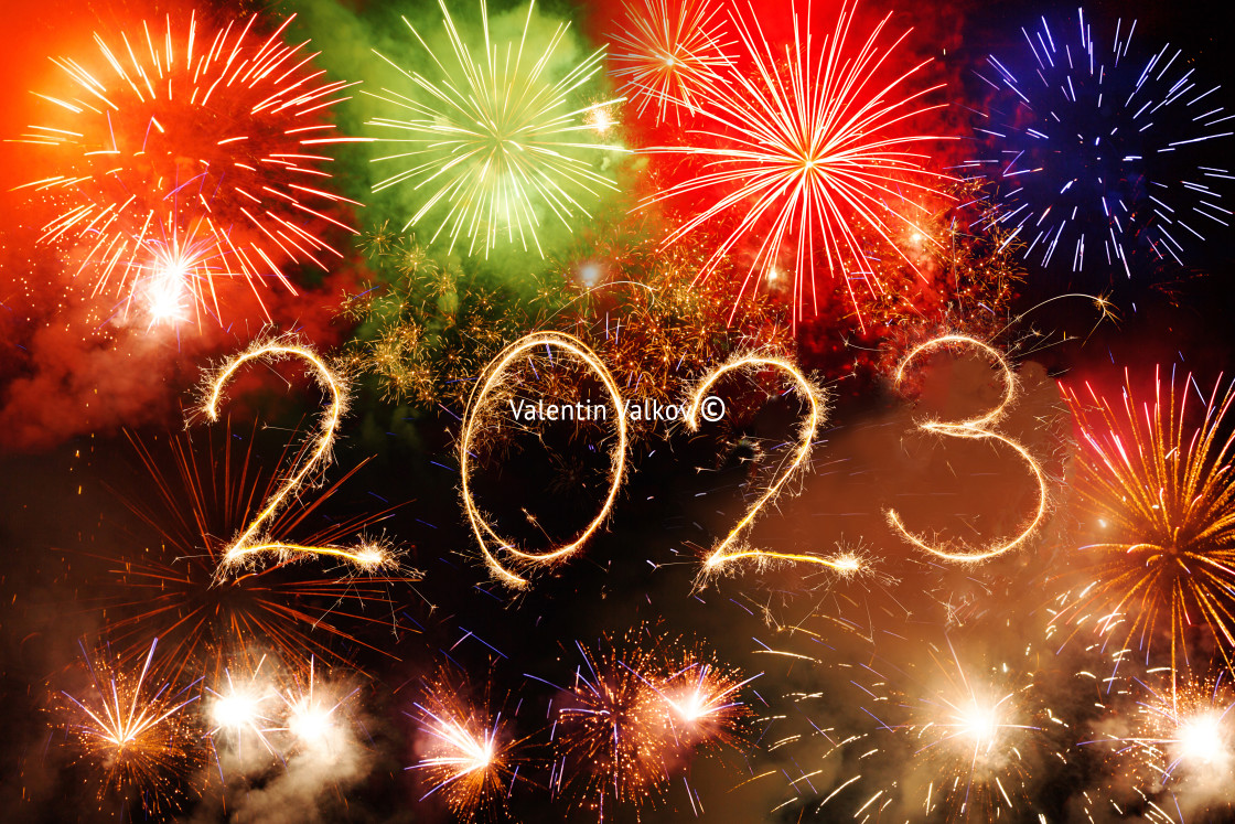 "Happy new year 2023 written with Sparkle firework on black backg" stock image