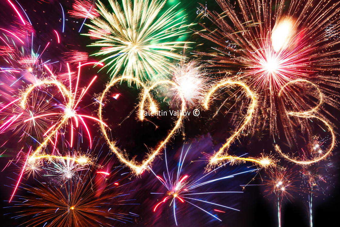 "Happy new year 2023 written with Sparkle firework on black backg" stock image