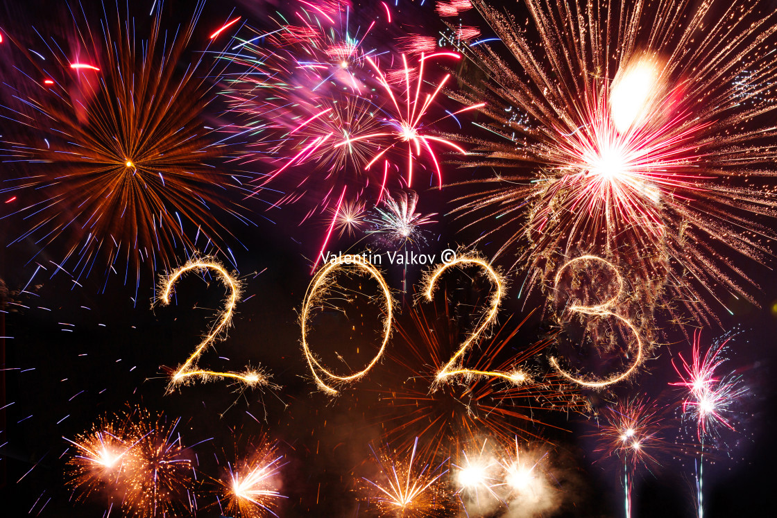 "Happy new year 2023 written with Sparkle firework on black backg" stock image