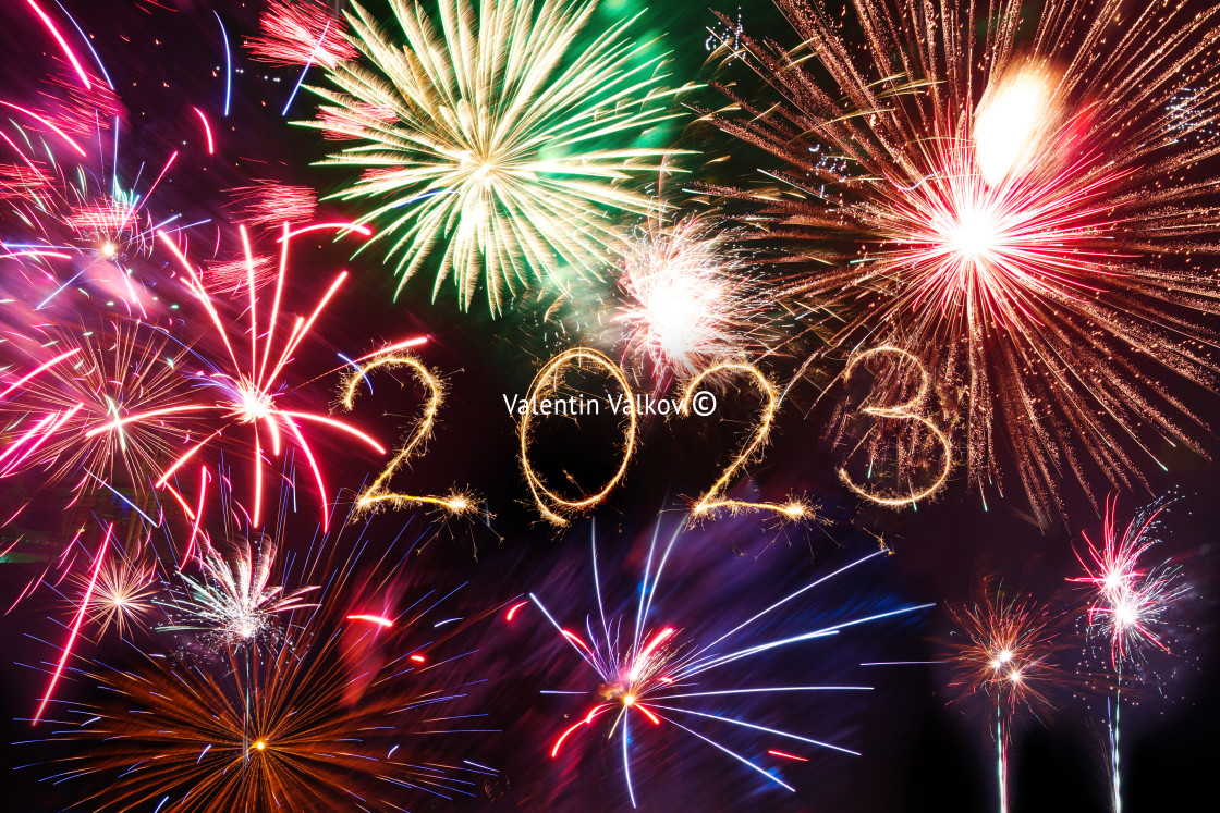 "Happy new year 2023 written with Sparkle firework on black backg" stock image