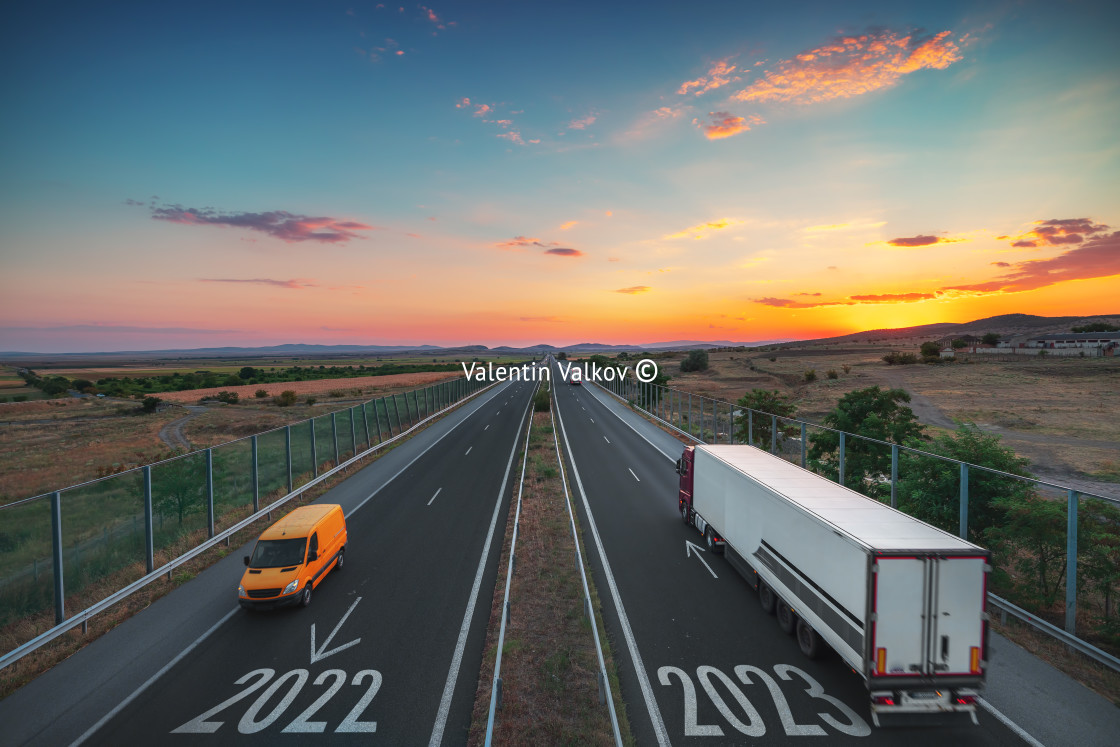 "Driving on open road at beautiful sunset. Aerial view" stock image