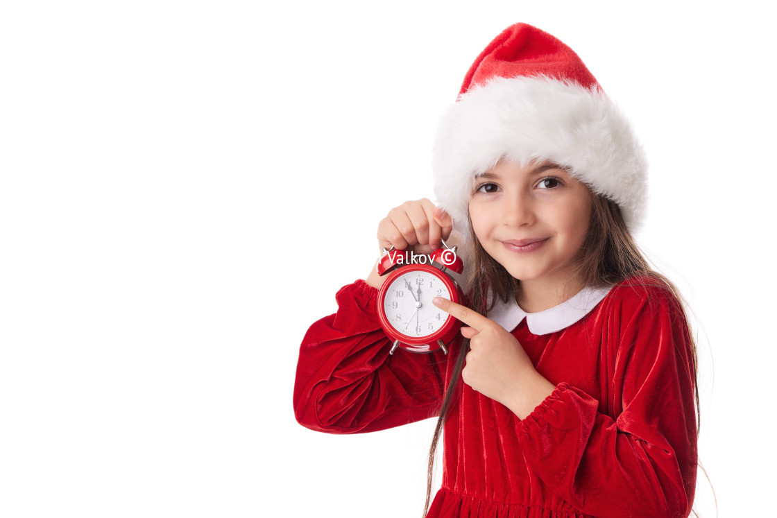 "Christmas woman with red alarm clock, smiling girl in red Santa" stock image