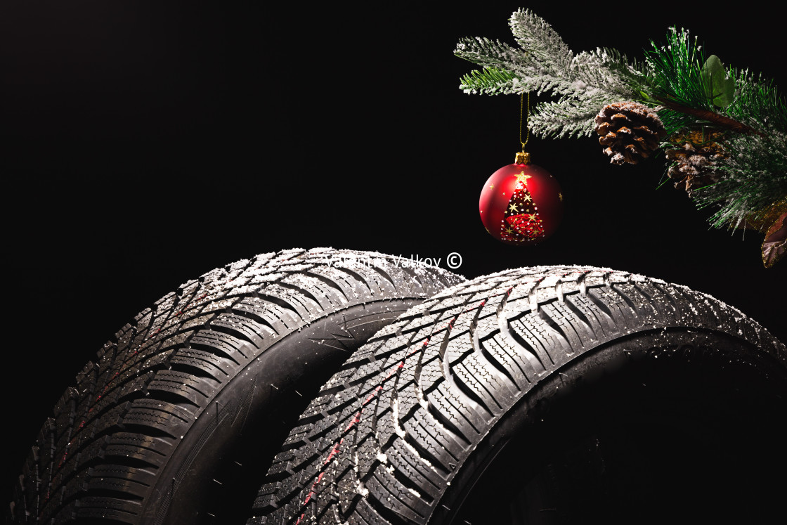 "Winter Car tire for snow and Christmas tree ball and decoration" stock image