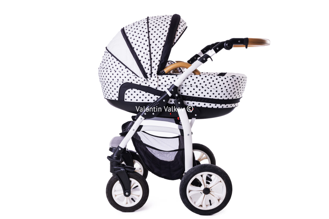 "Modern baby stroller with bassinet and car seat isolated on a wh" stock image