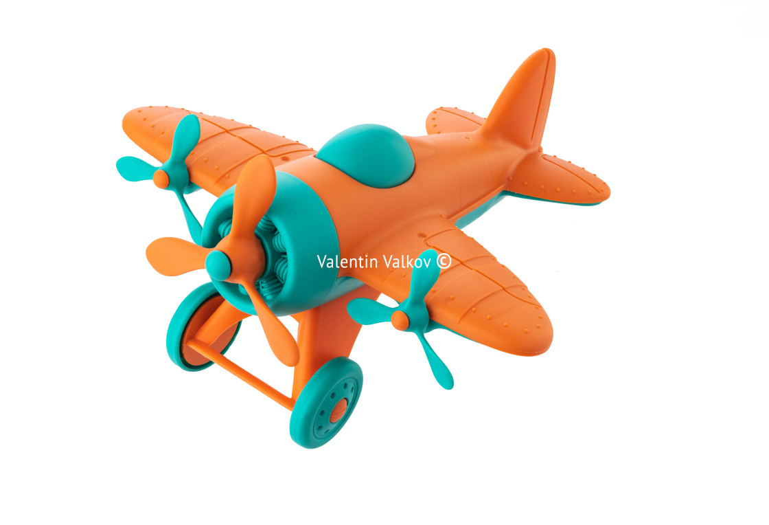 "Color plastic airplane toy for kids isolated on white background" stock image