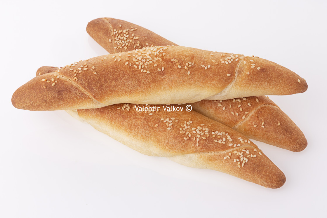 "Freshly baked crusty homemade butter rolls or baked horns with e" stock image