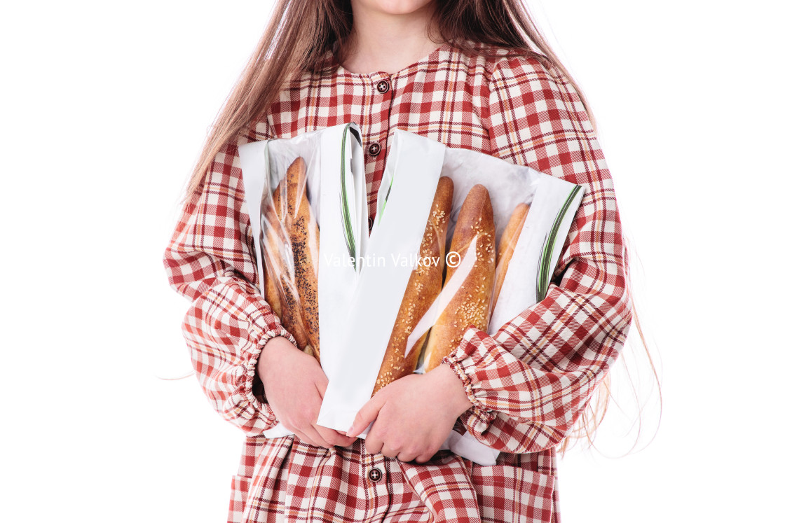 "Girl baker in vintage dress serving freshly baked homemade bread" stock image