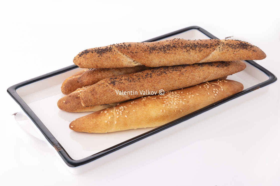 "Freshly baked crusty homemade butter rolls or baked horns with e" stock image