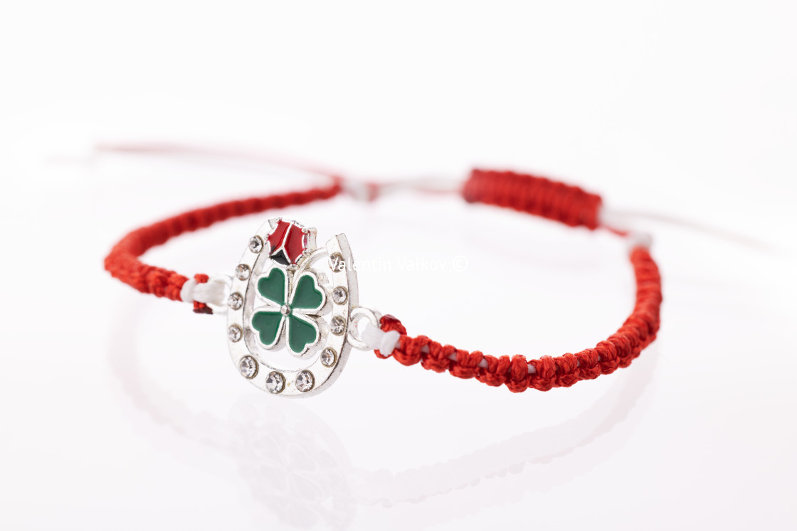 "Martisor talisman, martenitsa, martenitza for 1 March Baba Marta isolated on white background. Traditional accessory for holiday of early spring in Bulgaria, Romania, Moldova. Red and White yarn strin" by Valentin Valkov - $24.85 "Martisor talisman, martenitsa, martenitza for 1 March Baba Marta isolated on white background. Traditional accessory for holiday of early spring in Bulgaria, Romania, Moldova. Red and White yarn strin" stock image