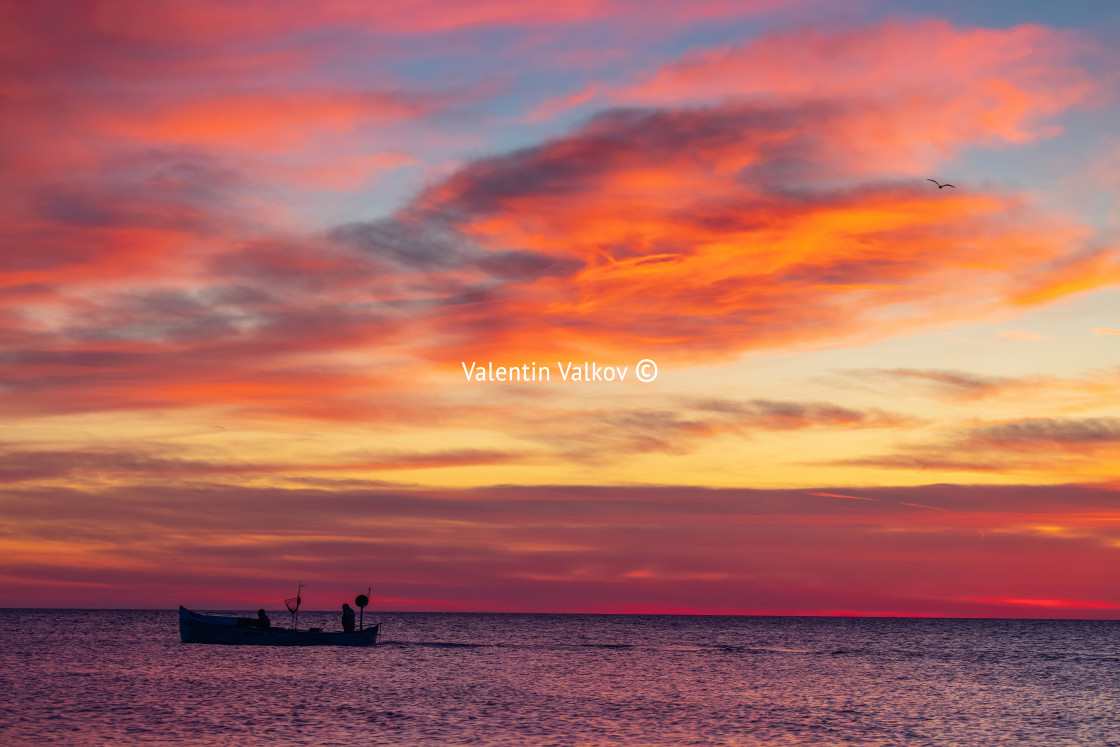 "Boat and sunrise" stock image