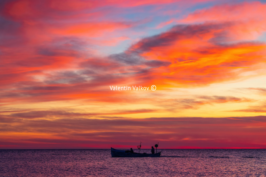 "Boat and sunrise" stock image