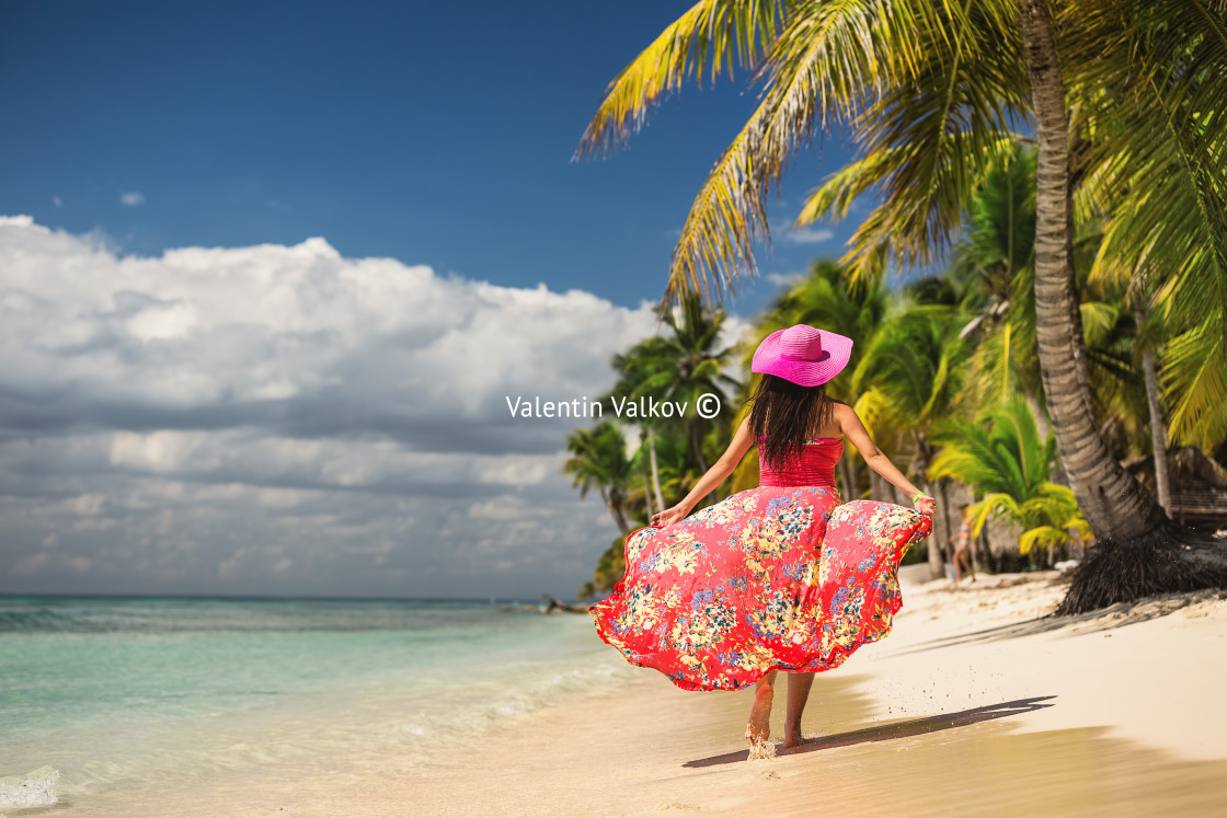 "Carefree young woman relaxing on tropical beach. Saona Island" stock image