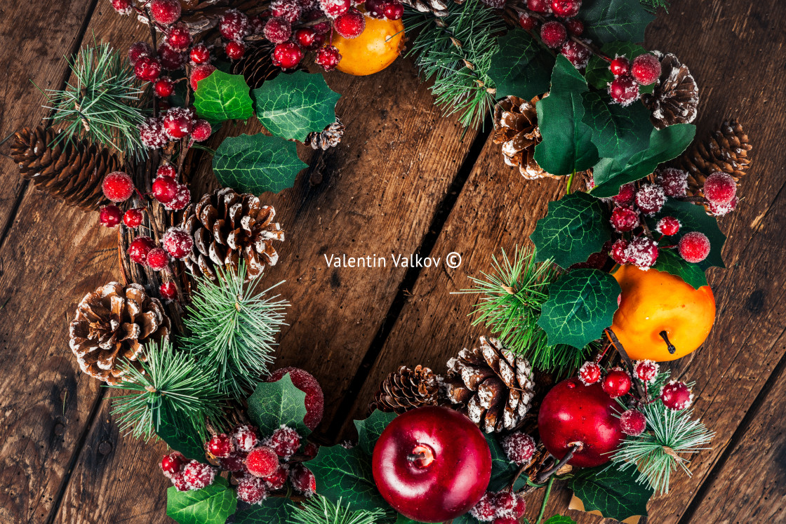 "Christmas Wreath on wooden background. Christmas Home Decoration with copy space for text" by Valentin Valkov - $38.02 "Christmas Wreath on wooden background. Christmas Home Decoration with copy space for text" stock image