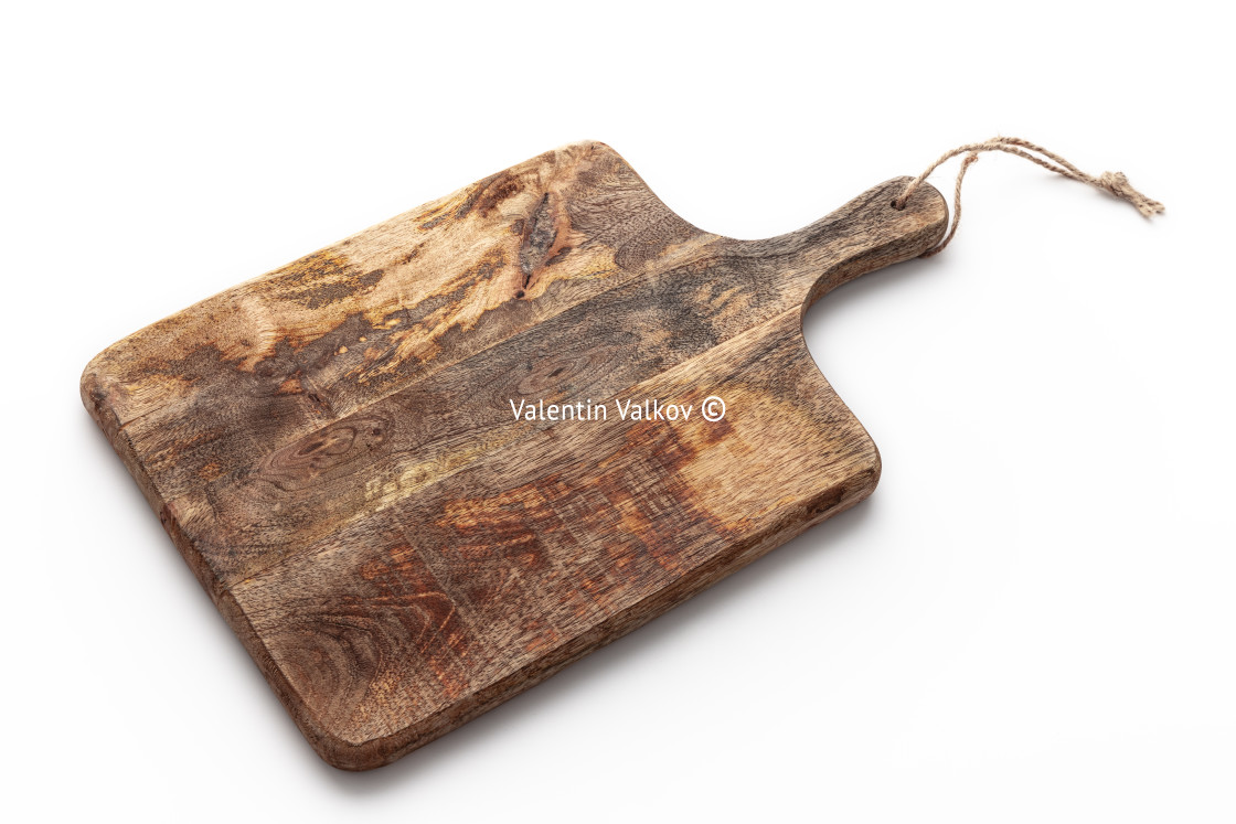 "Cutting board. Old, vintage, wooden chopping board isolated on white background." stock image