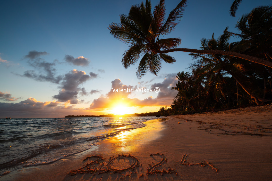 "Happy New Year 2024 concept, lettering on the beach. Written text on the sea beach at sunrise." stock image