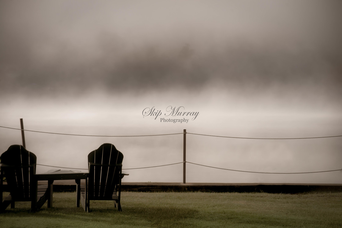 "Adirondack Chairs looking into the mist" stock image