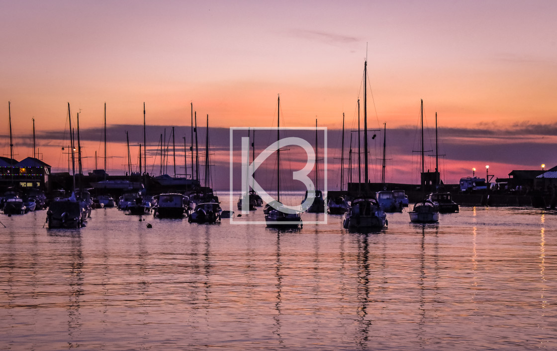 "Sunset in welsh harbour" stock image