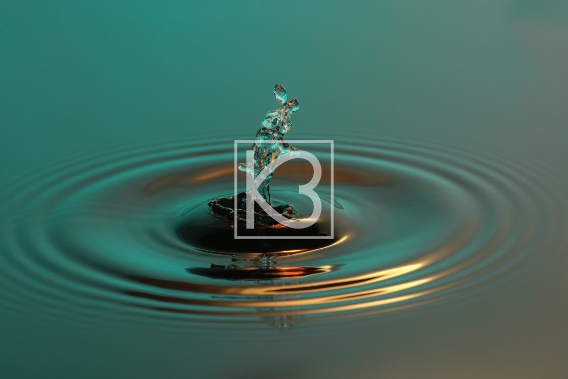 "Water drop collision in green" stock image