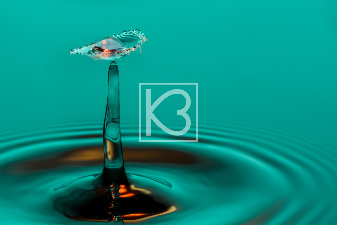 "Water drop collision in green" stock image