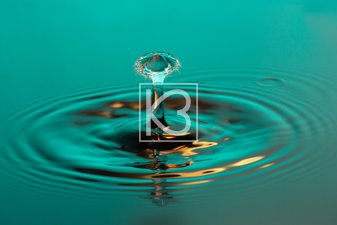 "Water drop collision in green" stock image