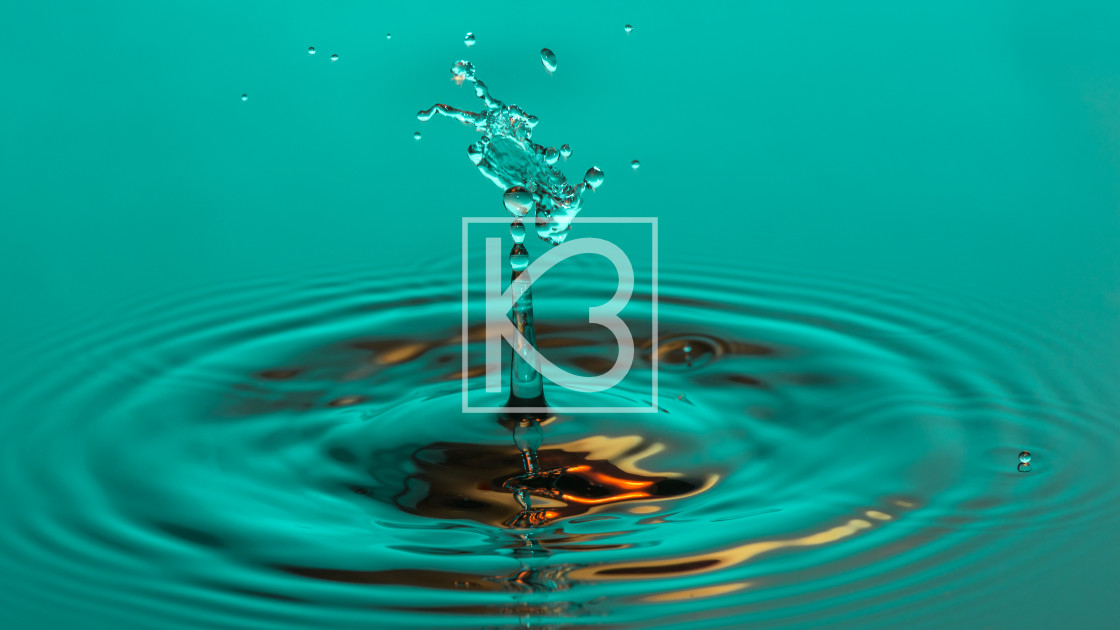 "Water drop collision in green" stock image