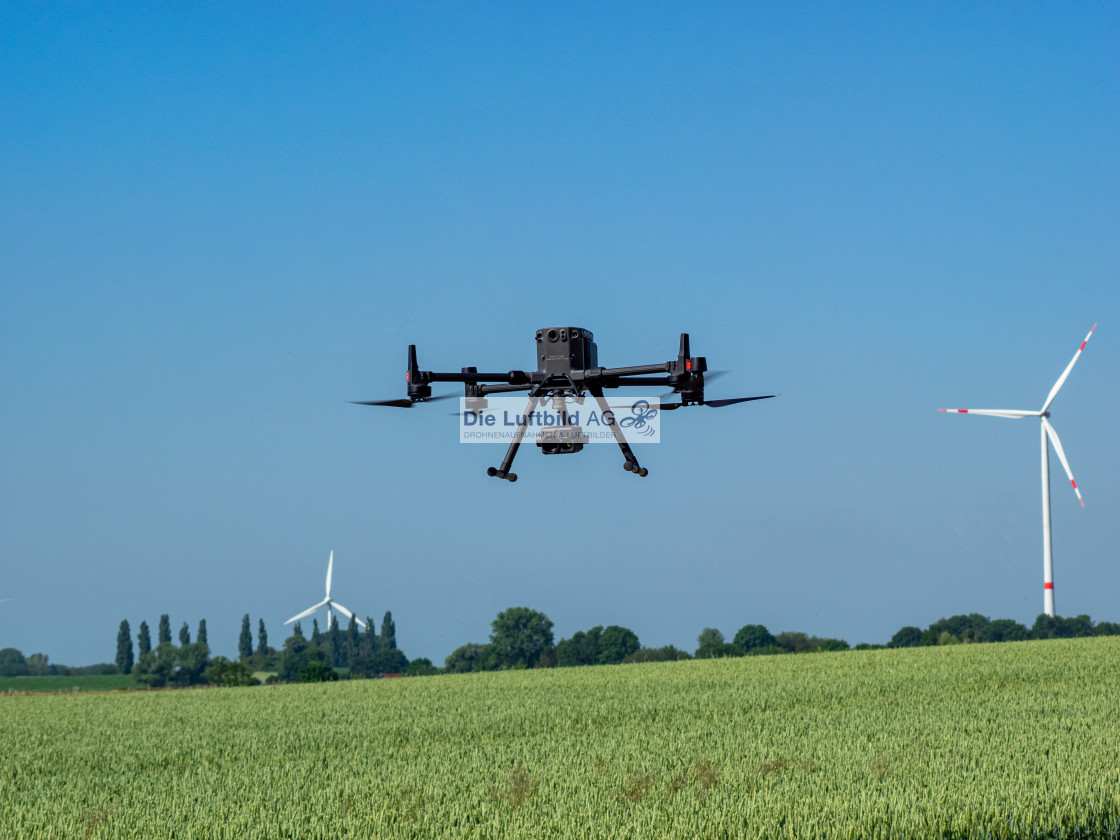 "Drohne in der Luft DJI M300 Windkraftanlage Aerial Drones" by Die Luftbild AG Hans-Jörg Behrendt - $1.23 "Drohne in der Luft DJI M300 Windkraftanlage Aerial Drones" stock image