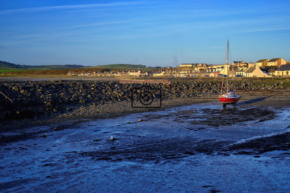 "Port William Habor with a winter sunset" stock image