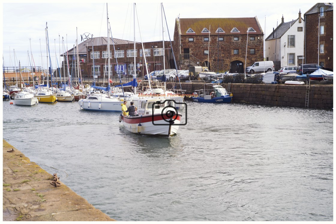 "Leaving North Berwick Harbour Scotland." stock image