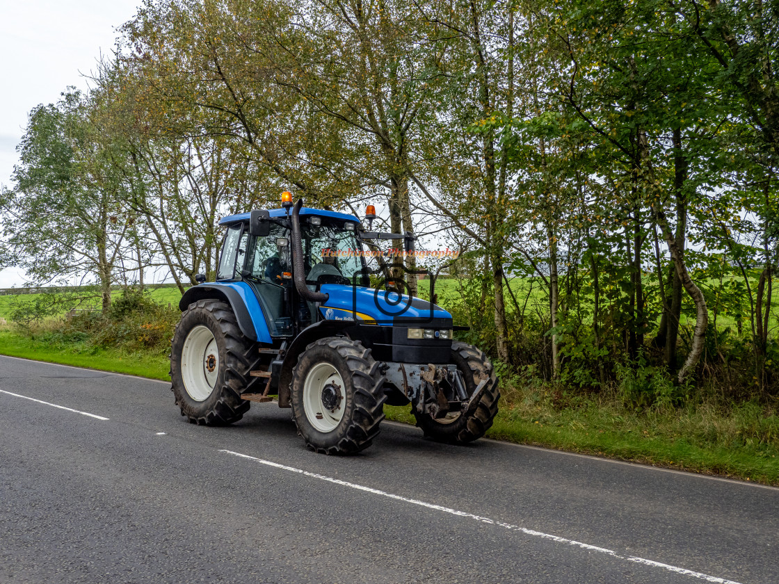 "New Holland TM120 tractor" stock image