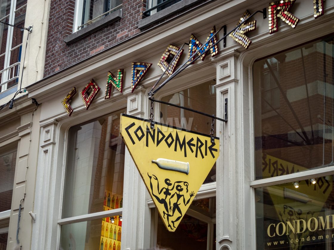 "Condomerie sign on condom store" stock image