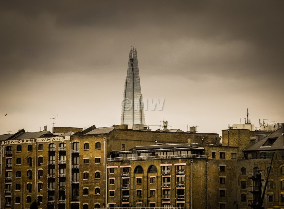 "New Crane Wharf with 'The Shard' building rising behind." stock image