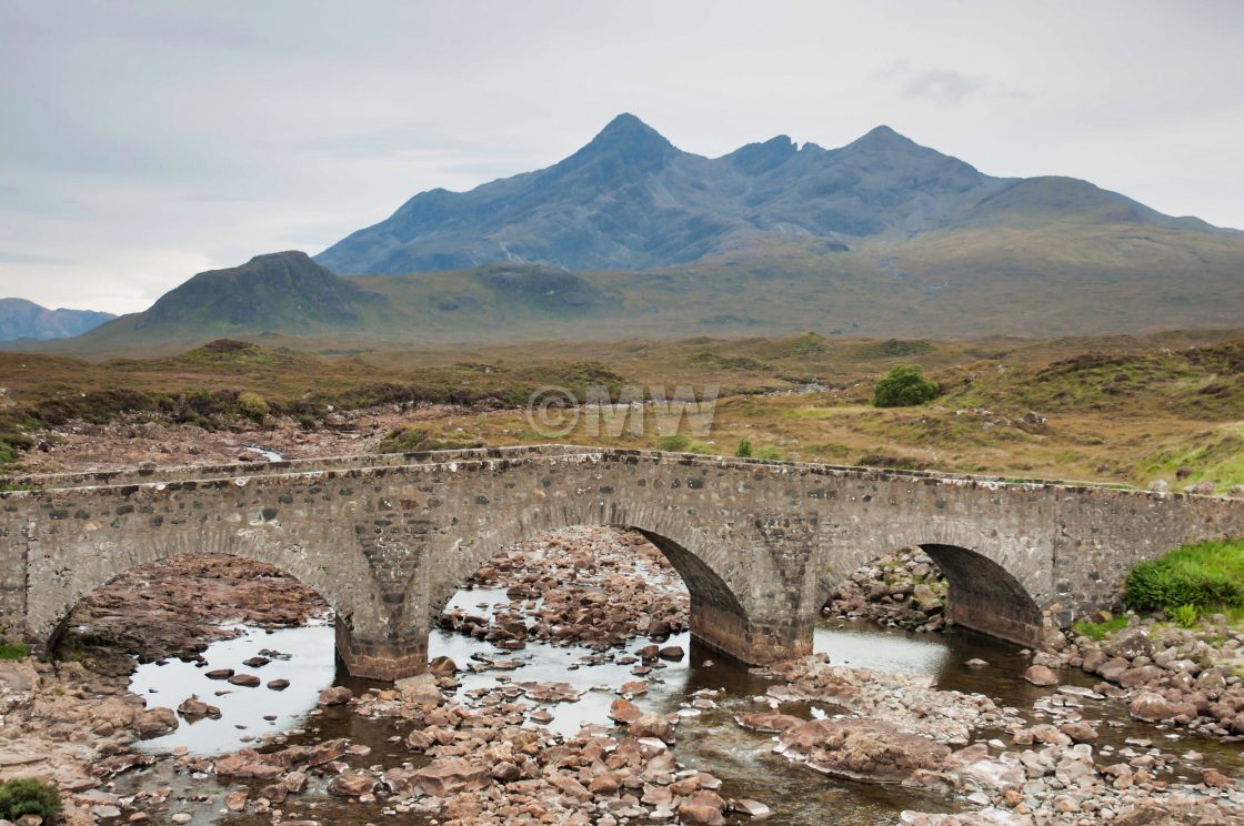 "Old bridge with view of Cuillin hills, Skye" stock image