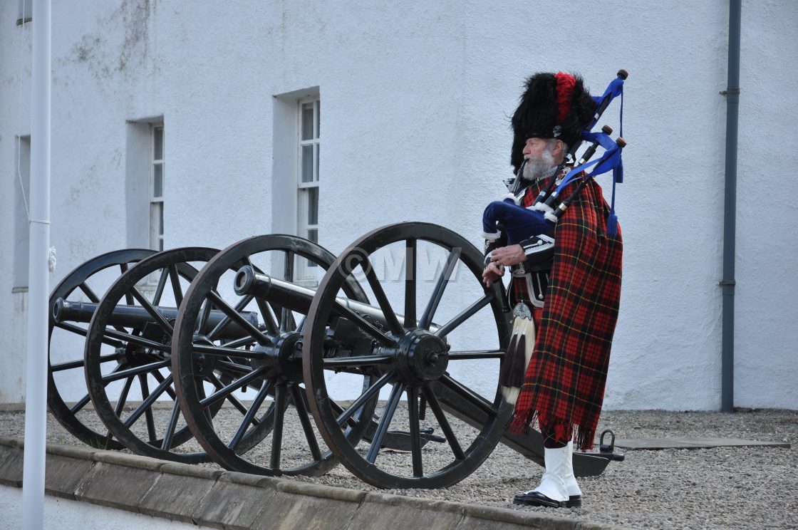 "Blair Atholl Castle, piper & cannon" stock image