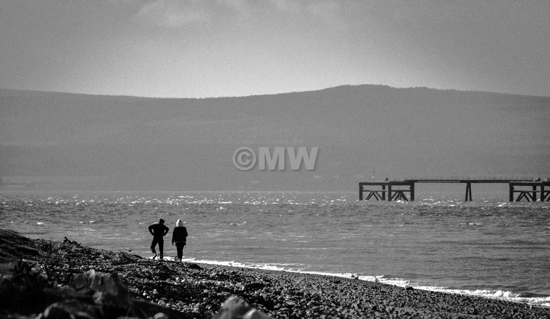 "Cromarty beach & figures" stock image