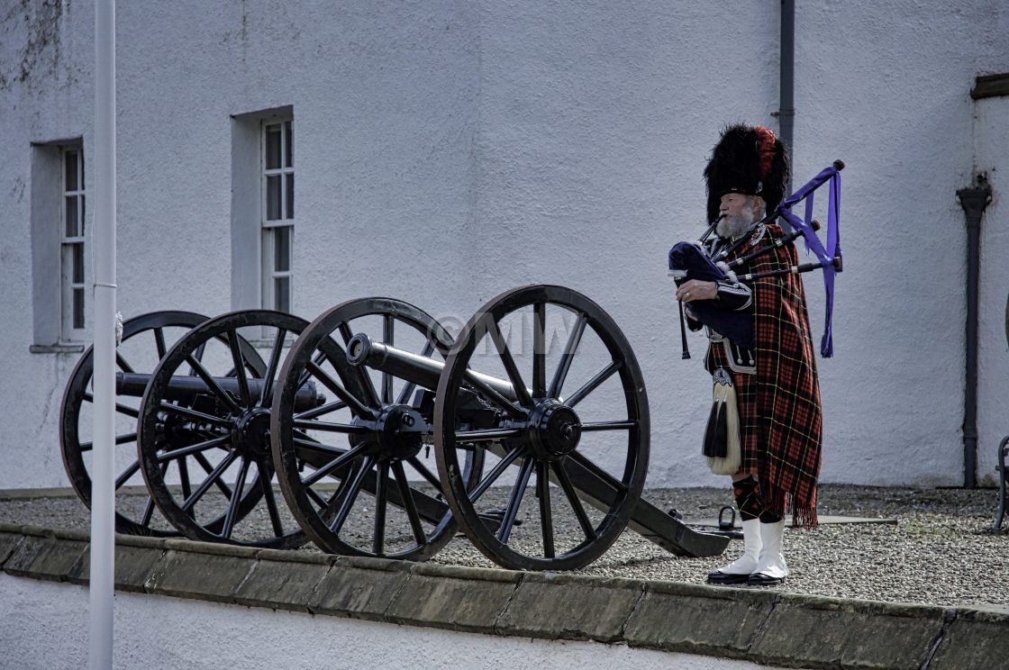 "Blair Atholl Castle, piper & cannon" stock image