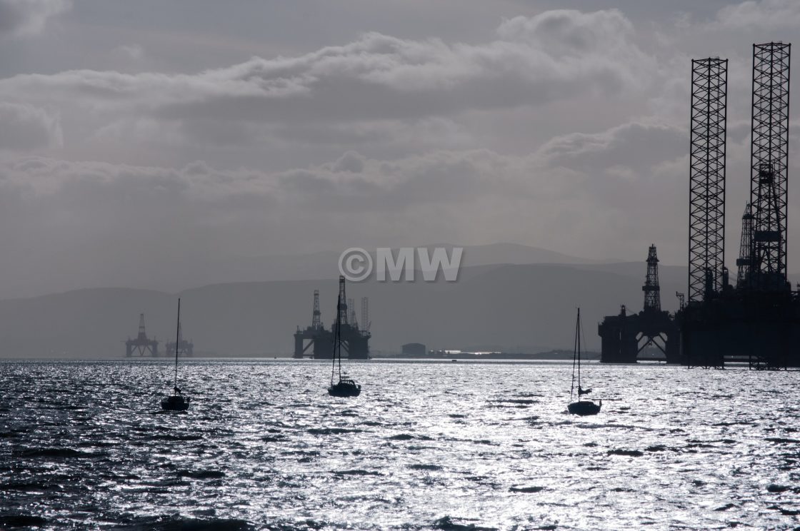 "Oil rigs and small boats on Cromarty Firth" by David Halperin - $35.13 "Oil rigs and small boats on Cromarty Firth" stock image