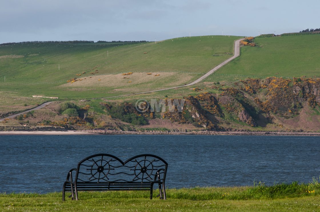 "Bench, sea, hill, road" stock image