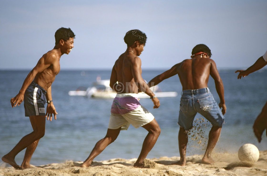 "Balinese boys playing soccer." stock image