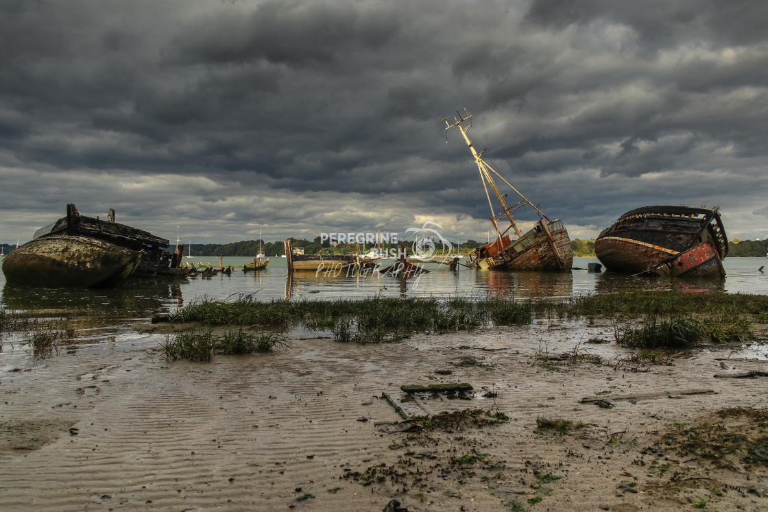 "Pin Mill boat wrecks at high tide" stock image