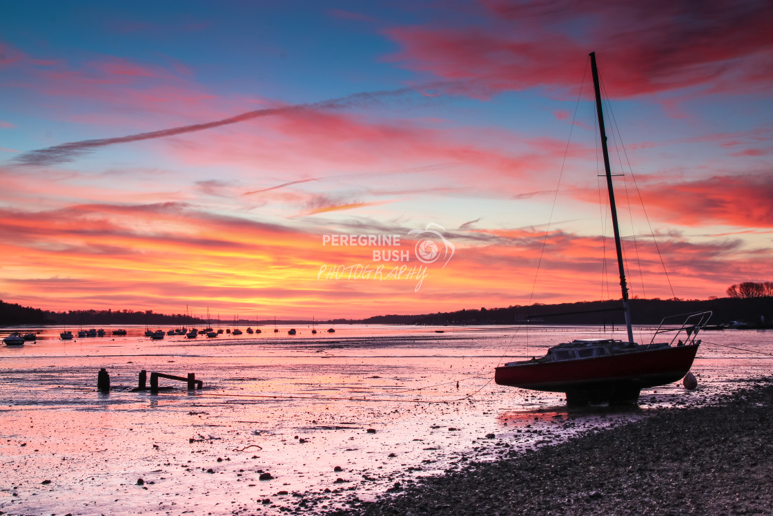 "Morning glow over Freston foreshore" stock image