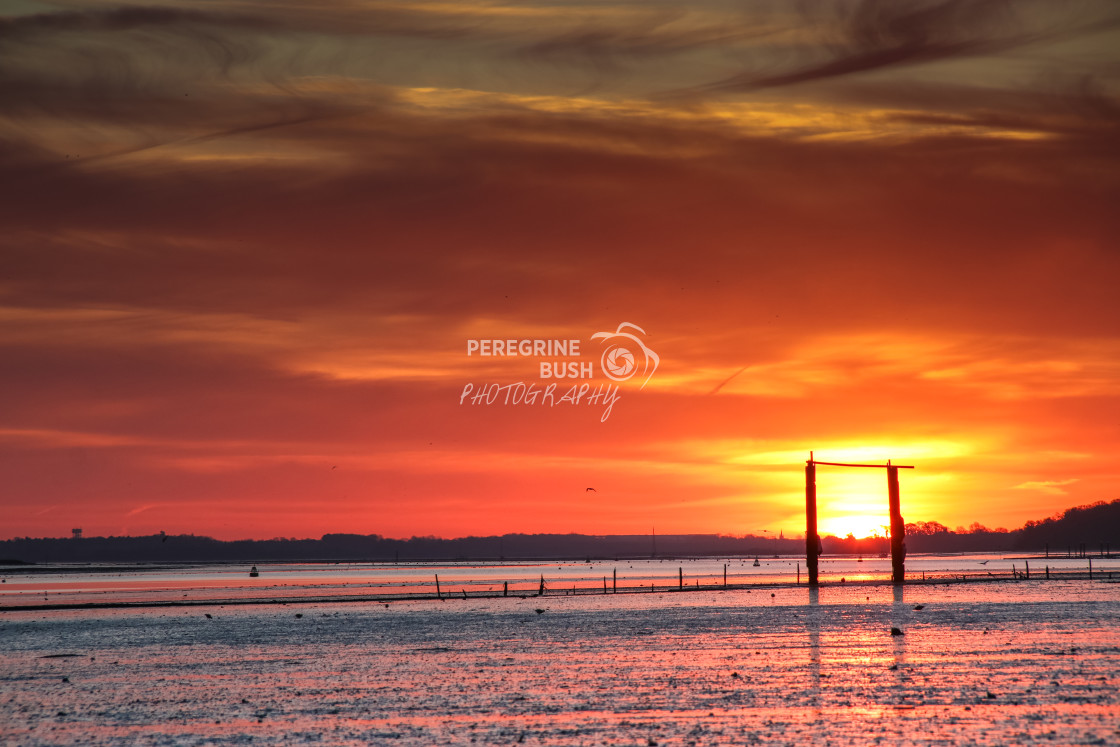 "Morning glow over Freston foreshore" stock image