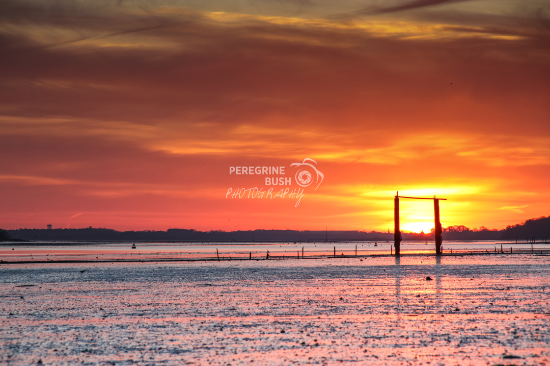 "Morning glow over Freston foreshore" stock image