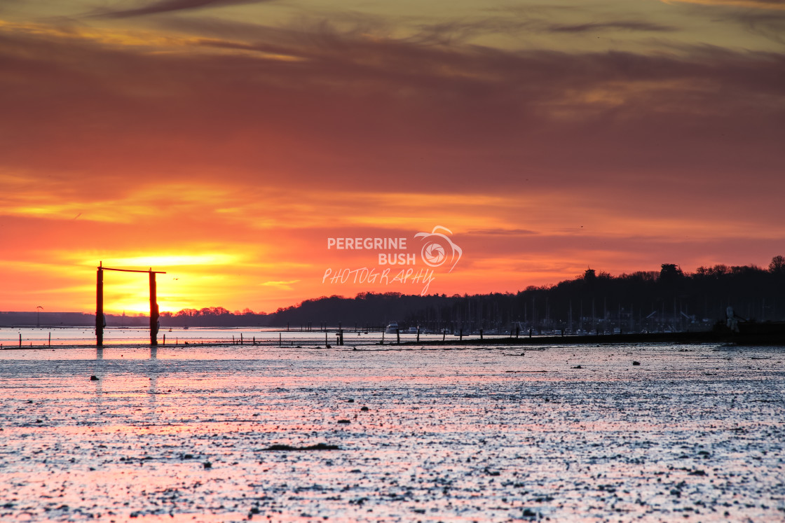 "Morning glow over Freston foreshore" stock image