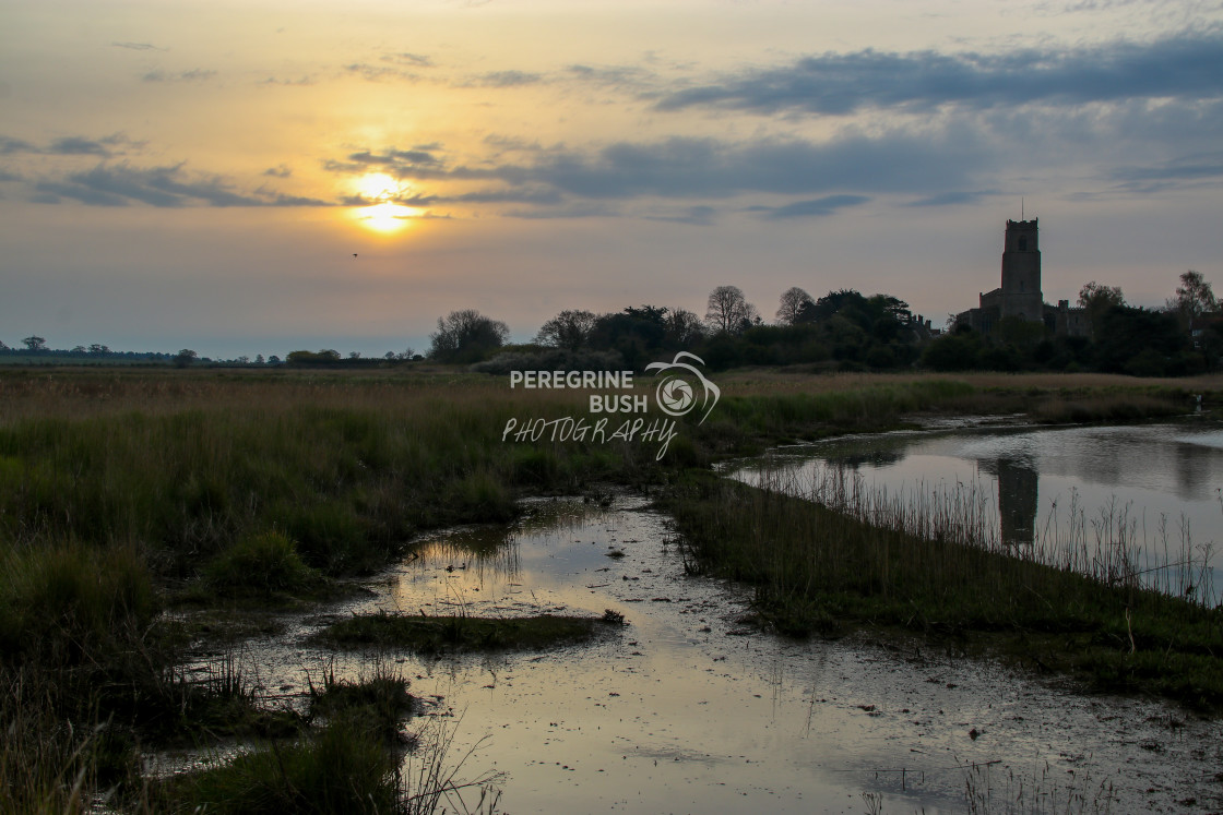 "Sunrise over the Cathedral of the Marshes, Blythburgh" stock image