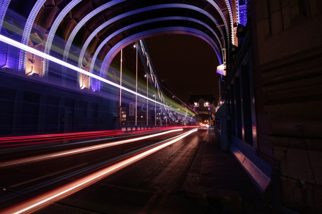 "Light trails over Tower Bridge." stock image