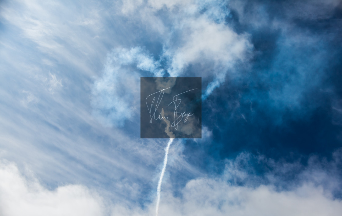 ""The heart" - the smoke from an old airplane looking like a heart in the sky." stock image